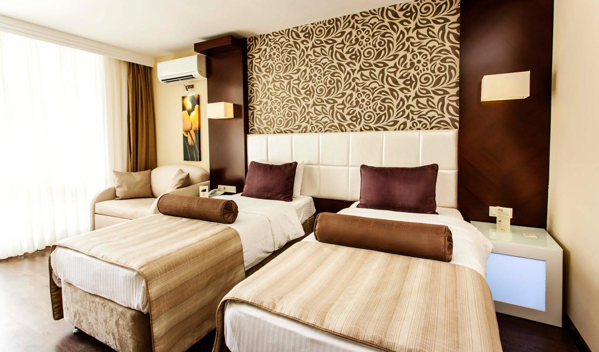 Deluxe Doppelzimmer mit Gartenblick + 2 Kinder